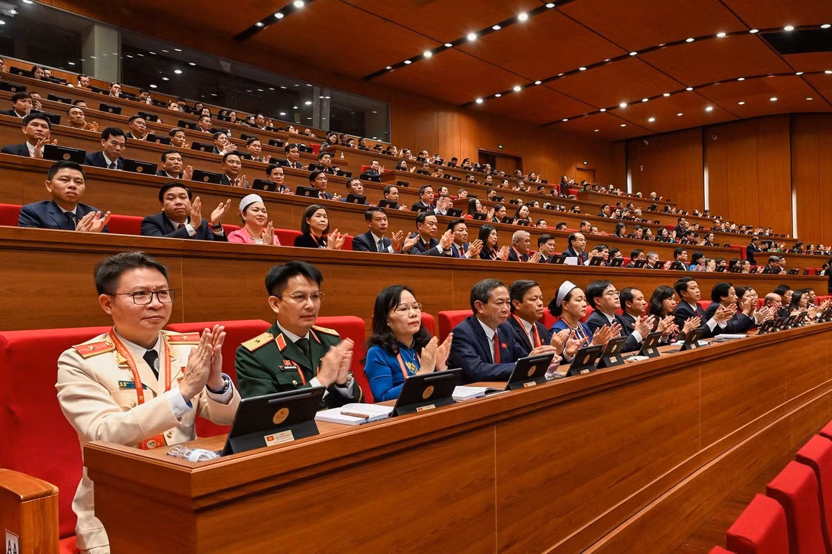 出席越南共产党第十四次全国代表大会开幕式的代表。